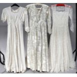 Early 20th Century Wedding Dresses, comprising a white net mounted long sleeved dress with floral