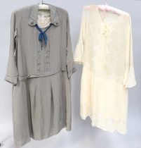 Circa 1920s Grey Silk Day Dress with drop waist, long sleeves, contasting blue silk buttons and neck