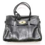 Circa 2009 Mulberry Bayswater Black Leather Bag, with brass postmans lock and fittings, padlock