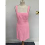 A Circa 2000 Chanel Boutique Wool Mix Pink Dress Suit, comprising a sleeveless dress with matching