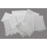 Assorted White Linen Table Linen, comprising tea cloths with crochet trims and floral embroidered