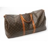 Louis Vuitton Keepall 60 Travel Bag in monogrammed canvas, leather trimmed with double leather