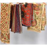 Mainly Early 20th Century Assorted Textiles, comprising a small Suzani style panel, worked on a