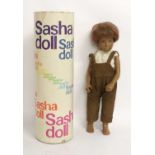 Late 1960/Early 1970s Gregor Sasha Doll, with a red wig wearing a white cotton t-shirt, brown cord