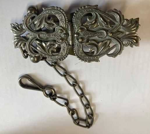 An Unusual Decorative Pierced Plated Skirt Lifter, Fyfe's Patent comprising two hinged decorative - Image 4 of 7