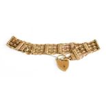 A Gate Link Bracelet, stamped '9' and '.375', length 19.2cmGross weight 18.4 grams.