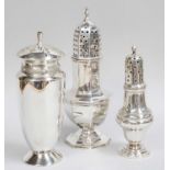 Three Edward VII or Elizabeth II Silver Casters, one octagonal and on spreading foot, by Emile