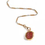 A Hardstone Swivel Fob on Chain, fob length 3.0cm, chain length 38cmFob stamped '15CT', chain