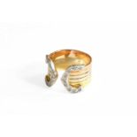 An 18 Carat Tri-Coloured Gold Diamond Cuff Ring, finger size N1/2Gross weight 7.0 grams.