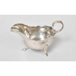 A George III Silver Cream-Boat, by John Langlands, Newcastle, 1774, oval and on three shell-capped