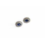 A Pair of Sapphire and Diamond Cluster Earrings, stamped 'K18', with post fittingsGross weight 2.2