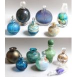 A Collection of Thirteen Scent Bottles, including Mdina (two trays)