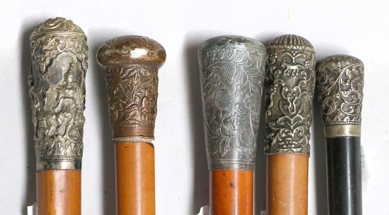 Four 19th Century Malacca Walking Canes, with Oriental white metal toppers; together with a - Image 2 of 2