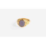 An 18 Carat Gold Hardstone Signet Ring, finger size K1/2Gross weight 7.9 grams.