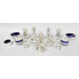 A Collection of Assorted Silver Condiment-Items, comprising a condiment-set with gadrooned border,
