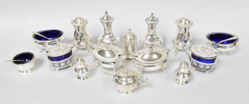 A Collection of Assorted Silver Condiment-Items, comprising a condiment-set with gadrooned border,