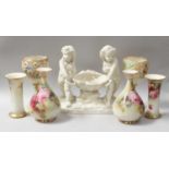 Royal Worcester Rose Painted Vases, a Moore & Co. style centerpiece and a pair of Nuatilus Porcelian