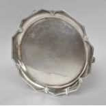 A George V Silver Salver, by Charles S. Green and Co., Birmingham, 1933, shaped circular and on