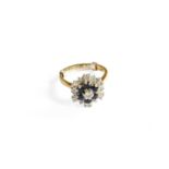 An 18 Carat Gold Sapphire and Diamond Cluster Ring, finger size I (approximately, ring clip fitted)