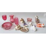 Seven Royal Crown Derby Imari Paperweights, a pin dish, and a quantity of cranberry glassOwl -