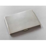 A George V Silver Cigarette-Case, by Smith and Bartlam, Birmingham, 1937, oblong and with an overall