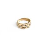 A 9 Carat Gold Diamond Triple Row Ring, the yellow bands overlaid with round brilliant cut