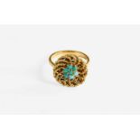 A Turquoise Cluster Ring, stamped '750', finger size LGross weight 5.9 grams.