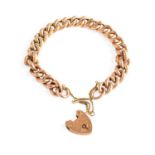 A Curb Link Bracelet, stamped ‘9C’, with a heart shaped padlock clasp, length 20cmGross weight 17.