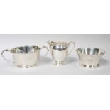 Two George V or George VI Silver Sugar-Bowls and a George V Silver Cream-Jug, the sugar-bowls each