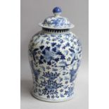 A Chinese Porcelain Baluster Jar and Cover, khagxi mark but 19th centuryFiring flaws. Restored