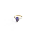 A 14 Carat Gold Tanzanite and Diamond Ring, finger size N1/2Gross weight 3.5 grams.