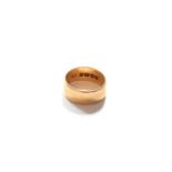 An 18 Carat Gold Band Ring, finger size MGross weight 7.1 grams.