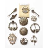 Twelve Silver and White Metal Brooches, of Scottish interest, of varying designs and sizesGross