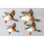 A Set of four Beswick flying ducksSome light crazing to each, but otherwise OK.