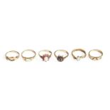 Six 9 Carat Gold Gem Set Rings, comprising of three sapphire examples, and three opal examples, of