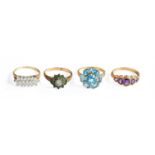 Four 9 Carat Gold Gem Set Rings, including emerald and diamond cluster example, an amethyst ring,