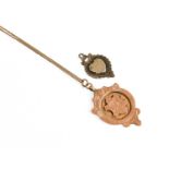 A 9 Carat Gold Medallion on Chain, pendant length 4.6cm, chain length 46.4cm; and A Silver