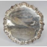 An Edward VII Silver Salver, by Roberts and Belk, Sheffield, 1903, shaped circular and on three