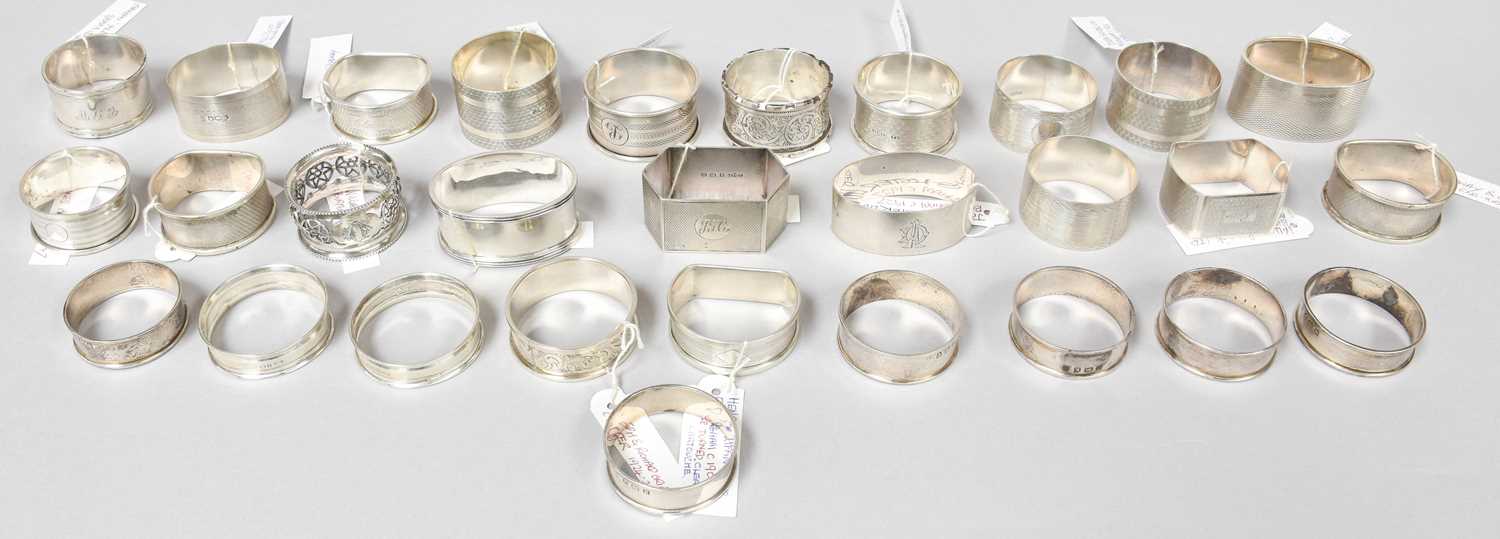 A Collection of Assorted Silver Napkin-Rings, variously decorated and shaped, most engraved with