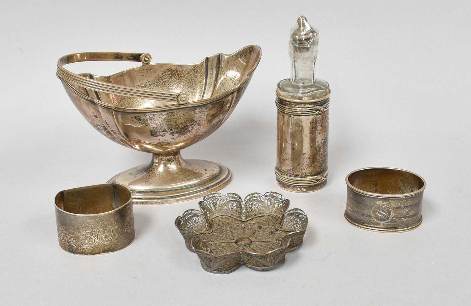 A Collection of Assorted Silver, including a sugar-basket; a glass scent-bottle in an associated