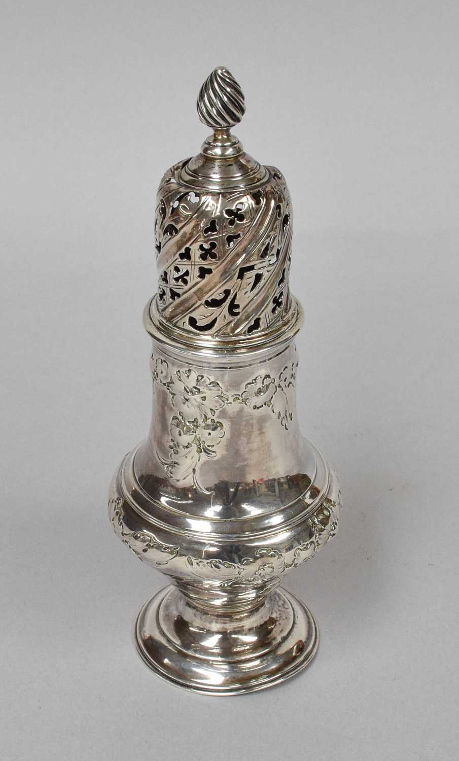 A George III Silver Caster, by Robert Peaston, London, 1762, vase-shaped and on spreading foot,