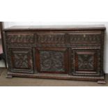 An Ornatley Carved Oak Sideboard, decortating with wheat sheaves and foliage, 167cm by 46cm by 89cm