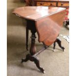 A Victorian Mahogany Sutherland Table, on gadrooned baluster supports, joined by a turned