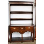A George III Oak Dresser and Rack of Small Proportions, with pot board stretcher, 106cm by 41cm by
