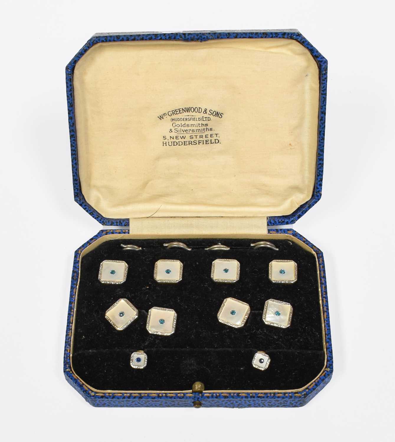A 9 Carat Gold Mother-of-Pearl Dress Stud, Cufflink and Button Suite, comprising of four buttons,