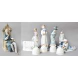 A Large Lladro Figure ''The Judge''; together with four other Lladro figures, four Lladro bells, a