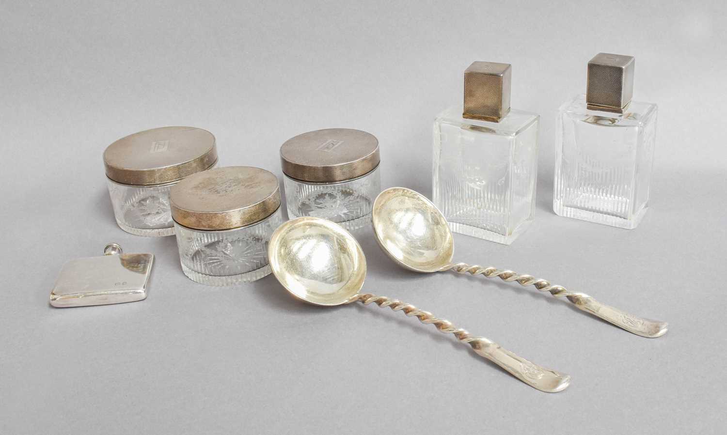 A Collection of Assorted Silver, comprising five silver-mounted etched glass dressing-table jars;