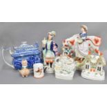 A Collection of Victorian Staffordshire Pottery Figures, including cottage models and pastille