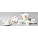 A Shelley Art Deco Part Coffee Service, printed and enamelled with crocus, comprising coffee pot,