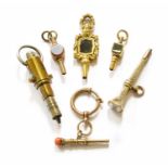 Five Late 19th Century Watch-Keys and a Cannon-Shaped "Birches patent" Watch-Key, three set with a